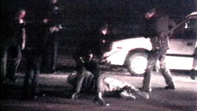 Mar 3, 1991, Los Angeles, CA, USA, television frame grab from of the famous video of Rodney King and Los Angeles Police Department beating during his arrest after a high speed pursuit for driving while intoxicated on Interstate 210, video shot by George Holliday. police brutality, law enforcement, racism